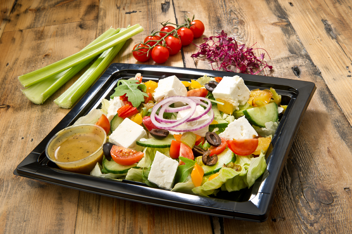 Fresh salad prepared for events or delivery
