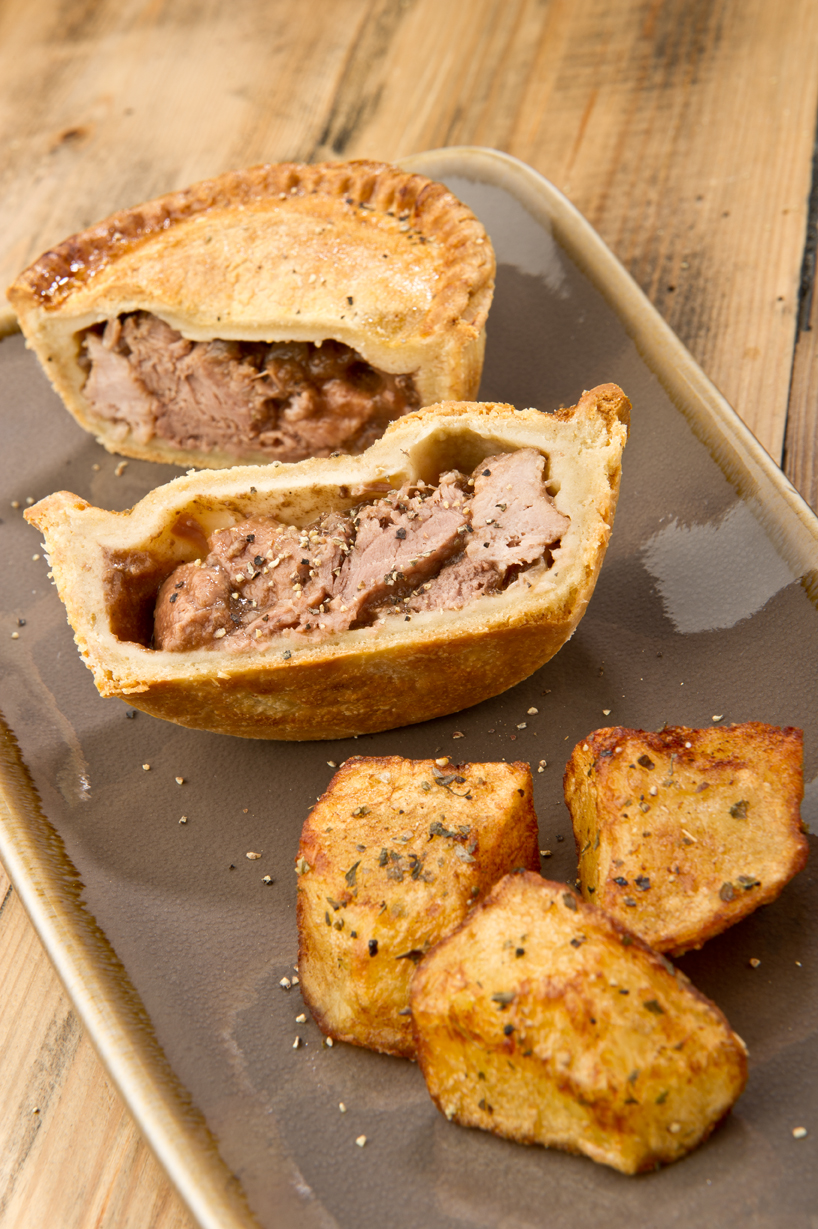 Posh pie sliced with potatoes