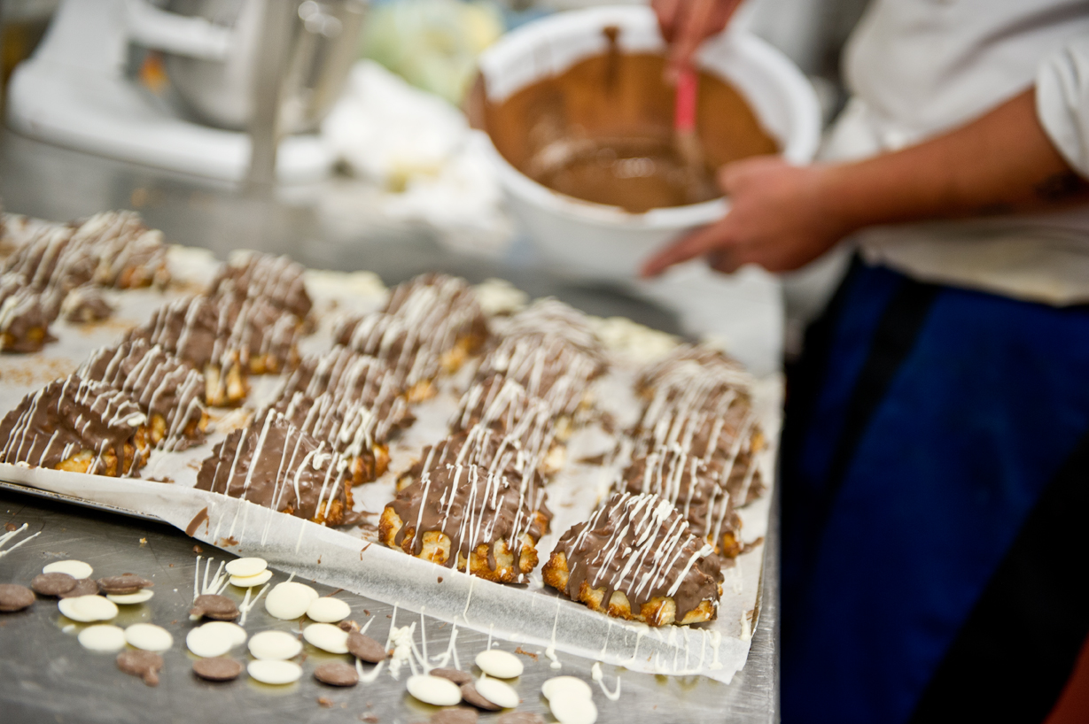 Cakes being prepared by a chef for a catering order