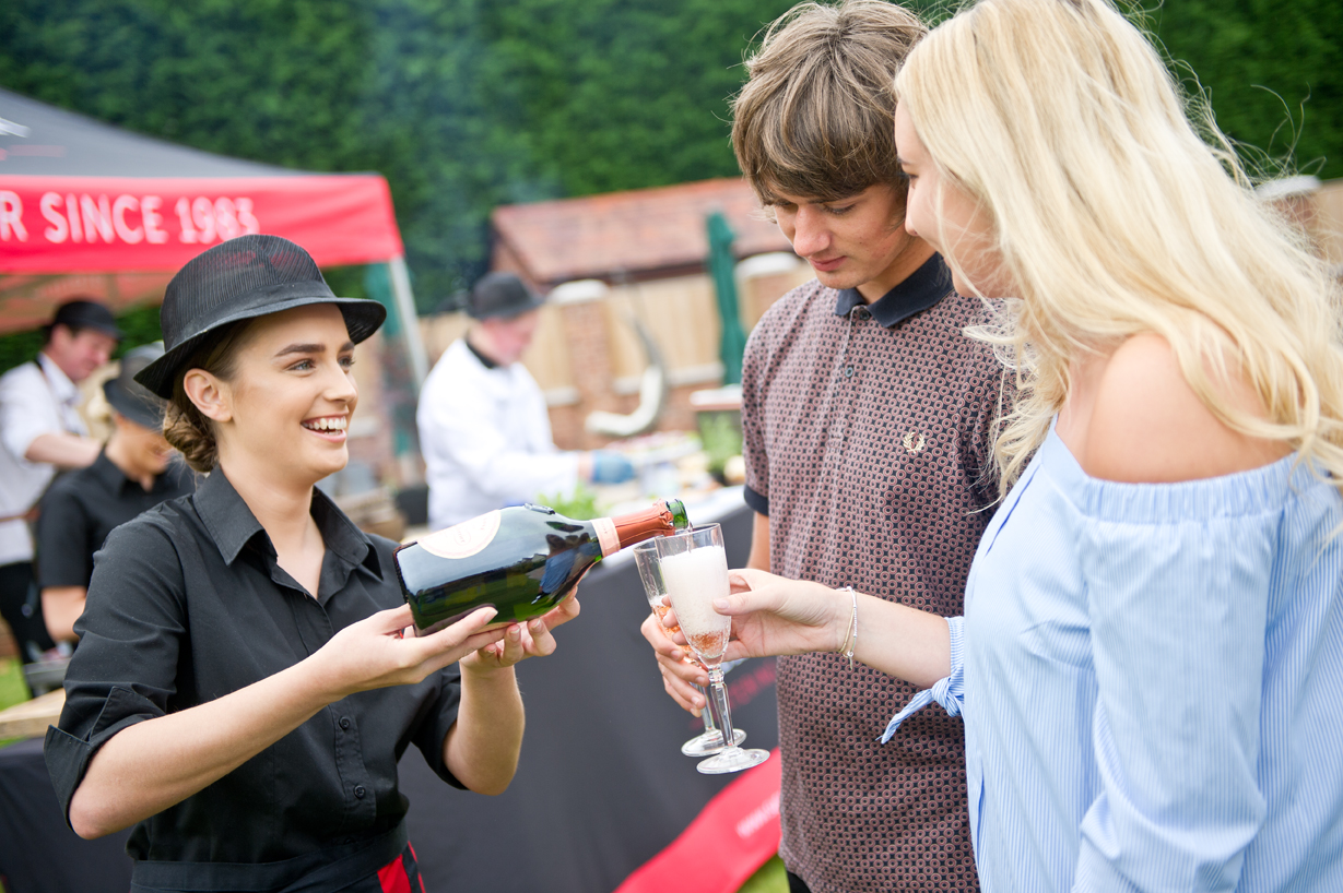 Wedding catering staff serving drinks